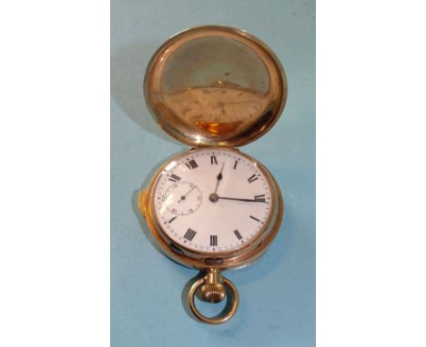 A 9ct gold hunter-cased repeater pocket watch, the white enamel dial with Roman numerals and seconds subsidiary, the unsigned