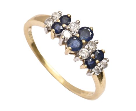 A sapphire and diamond ring, in 18ct gold, marked 0.25 ct, London, no date letter, 3.1g, size Q  Good condition