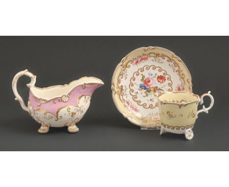 An H &amp; R Daniel coffee cup and saucer, c1827, of C-scroll shape, painted with flowers, saucer 14.5cm diam and an H &amp; 