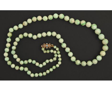 A necklace of jade beads, c1930, graduated from 4-9mm, with earlier, 19th c turquoise set gold cylindrical clasp, 53.6g  Good
