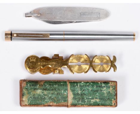 A folding knife with engine turned silver scales, 84mm l, Birmingham 1994, a Victorian brass sovereign balance, in paste boar