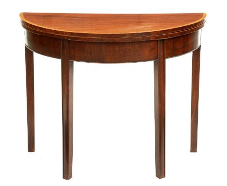 A George III mahogany tea table, the crossbanded top on moulded legs, 72.5cm h; 45 x 91cm  Light re-polished many years ago a