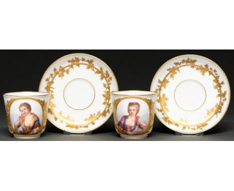 A pair of Sevres tea cups and saucers, late 19th c,&nbsp;outside-decorated, the cups with portraits of young women in cisele 