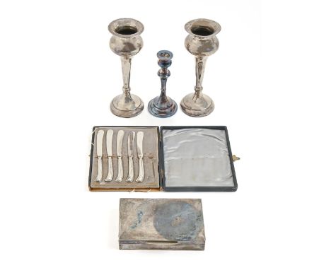 A pair of silver vases, early 20th c, 22cm h, marks rubbed, loaded, a silver candlestick, Chester 1921, loaded, a silver ciga