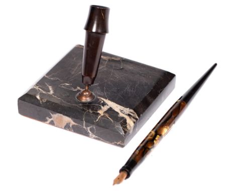 A Minerva fountain pen, c1930, of marbled and black celluloid, impressed MINERVA MARC. DEP. / ENCYCLOPEDIA TRECCANI, gold nib