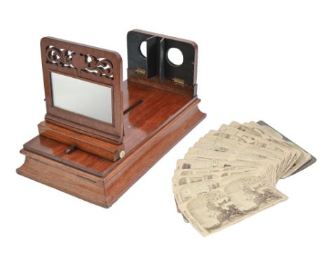 A Victorian mahogany table stereoscope, Rowsell's Patent Graphoscope, 39cm l, maker's bone trade label and 18 stereograms (al