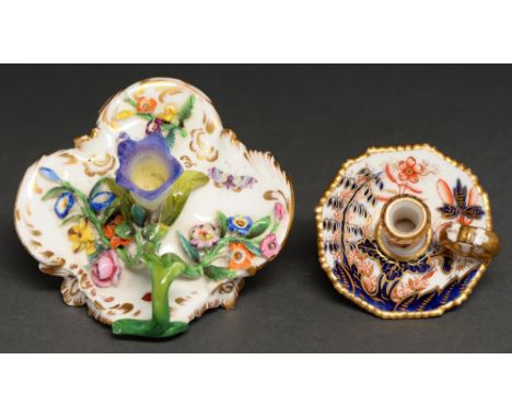 A Coalport 'Coalbrookdale' floral encrusted four footed taperstick, c1830, 60mm h, underglaze blue printed mark C Dale, colle