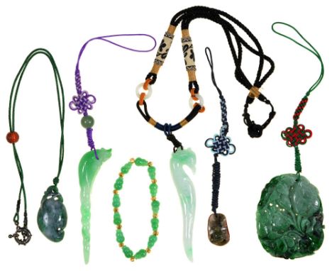 Five Chinese carved jade pendants, late 20th c, of shell, seahorse or other form and a jade bracelet, various sizes (6)  Good