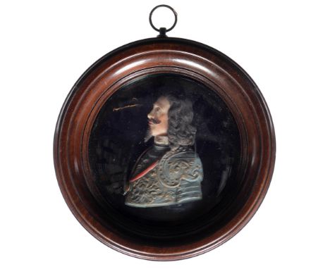 A painted wax bas relief portrait of King Charles I, 19th/20th c, on&nbsp;black glass in turned walnut frame, 15cm diam  Loos