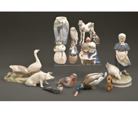 Thirteen Royal Copenhagen figures, groups and animals, second half 20th c, various sizes and a Royal Copenhagen vase, printed