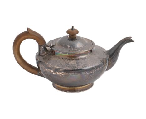 A Victorian silver teapot, engraved with scrolling foliage in Greek key borders, crested, 12cm h, by William Hunter, London 1