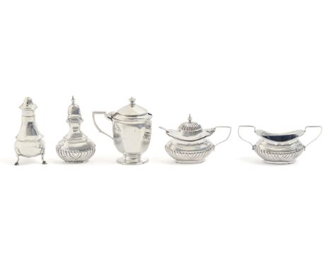 An Edwardian silver condiment set, pepperette 90mm h, by Thomas Henry Blake, Sheffield 1905, a silver pepperette and an octag