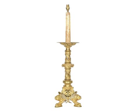 A French Gothic Revival gilt lacquered brass altar candlestick, late 19th c, 60cm h, adapted as a lamp  Good condition