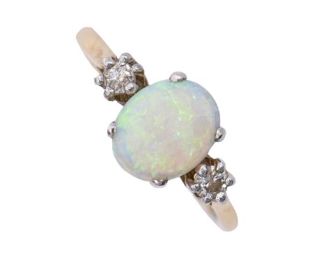 An opal and diamond ring, early 20th c, in gold marked 18ct, 2.6g, size J½  Opal with faint natural hairline at one end, not 