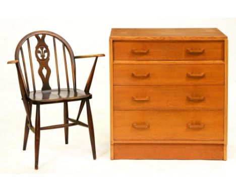 A 1970s teak chest of drawers, 85cm h; 76 x 45cm and an Ercol elbow chair (2)  