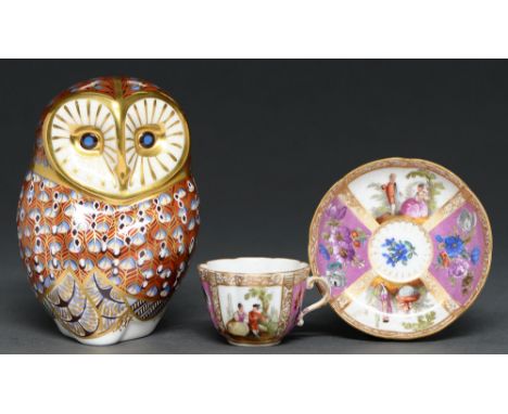 A Royal Crown Derby owl paperweight, 2000, 11cm h, printed mark, gilt stopper and a miniature German porcelain cup and saucer