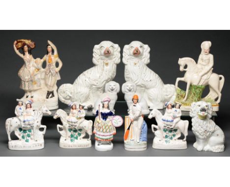 A pair of Staffordshire earthenware models of spaniels, one other and six various contemporary&nbsp; flatback figures and gro