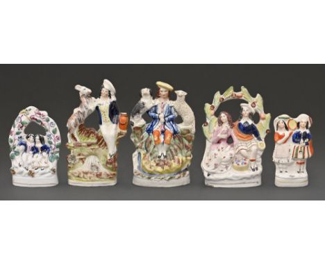 Five Staffordshire flatback figures and groups, mid 19th c, 20cm h and smaller  Arbor group broken and restuck, the others go