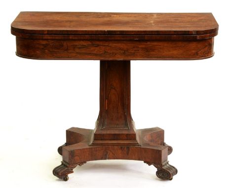 A William IV rosewood card table, on panelled pillar, platform and volute feet, with castors, 75cm h; 48 x 97cm  A good quali