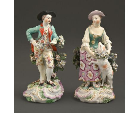 A pair of Derby figures of Garland Shepherds, c1775, 21cm h, patch marks  Man - some typical chipping of the bocage, old rest