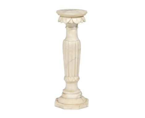 A carved and turned marble torchere, early 20th c, on reeded pillar and octagonal base, 70cm h  Minor chips and losses
