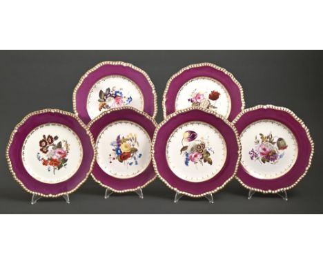 A set of six Spode dessert plates, 1822-1823, painted in the centre with a floral bouquet, in gilt cavetto and magenta border
