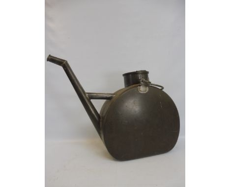 A very large steel water carrier, probably railway or steam engine related.