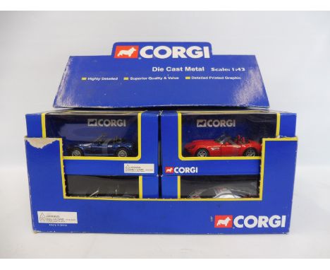 A boxed Corgi 1:43 scale racing car trade pack containing 12 individually boxed models. 