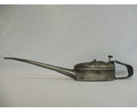 An unusual large scale steel oiler, probably Continental, stamped M.Raum to the handle.