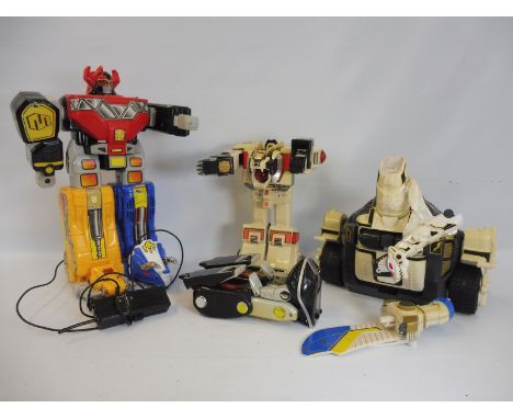 A quantity of large scale Power Rangers and Transformers. 