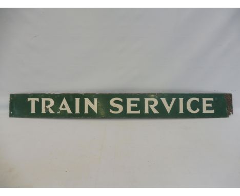 A 'Train Service' rectangular enamel sign in Southern Region green and white colours, 47 x 5". 