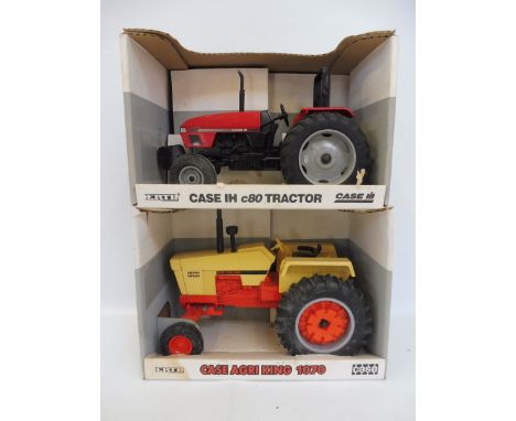 Two boxed Ertl 1;16 scale tractors comprising a Case IHC80 tractor and a 1070 agri-king. 