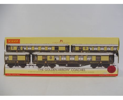 A boxed Hornby OO gauge Golden Arrow Coach set. 