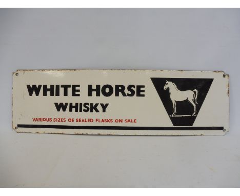 An enamel sign advertising 'White Horse Whisky', by repute sold to the vendor by the White Horse pub at Biddestone, 24 x 7". 