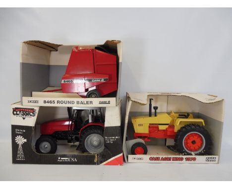 Two boxed Ertl 1:16 scale die-cast agricultural vehicles comprising a 1070 agri-king and the 8465 round baler. 