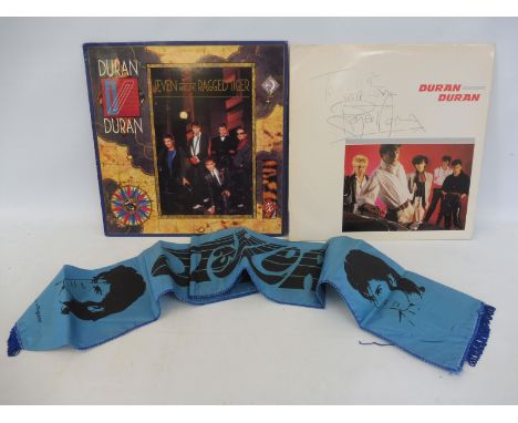 Duran Duran - two LPs signed to front, plus an original tour scarf.