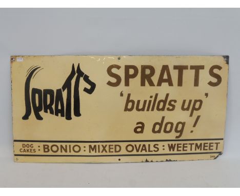 A Spratt's 'builds up' a dog! enamel sign, heavily repainted, 24 x 12".