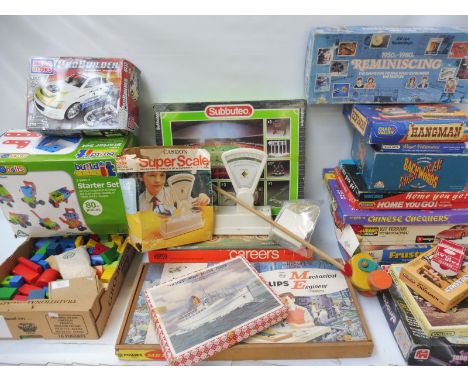 A large quantity of assorted games including Subbuteo and The Whippersnappers Train Set by Berwick etc. 
