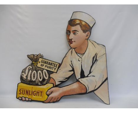 A Sunlight Soap £1000 Guarantee of Purity pictorial die-cut enamel sign depicting the 'baker boy' facing left, some restorati