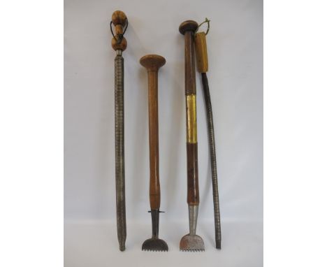 A selection of assorted tools, including two tanning scrapers.