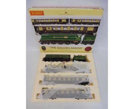 A boxed Hornby 'The Golden Arrow' train set including the 462 Battle of Britain Class locomotive.