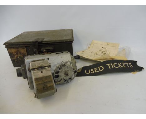 A Ticket Issue Machines (T.I.M.) Ltd of Cirencester ticket machine, in a metal case, stamped H. Jew &amp; Co.