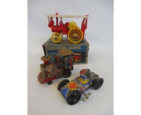 A boxed Clockwork Marvel Traction Engine, Tri-ang product made by Rovex Industries Ltd. plus a Japanese tinplate racing car a