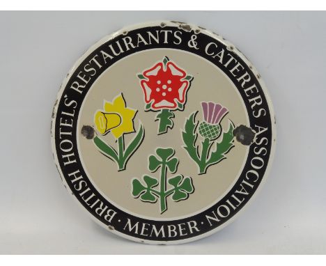 A British Hotels Restaurants &amp; Caterers Association circular enamel plaque, 9" diameter. 