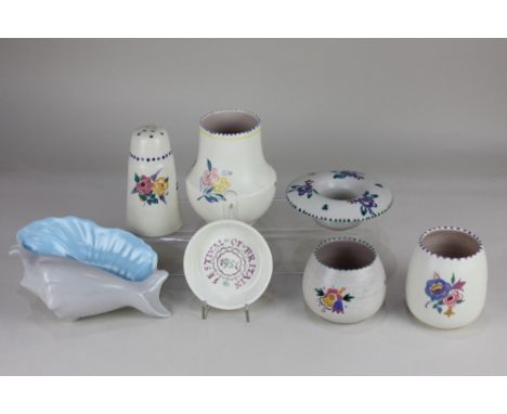 A Poole pottery 1951 Festival of Britain commemorative trinket dish, 10cm diameter, and a Poole pottery flour sifter, 13cm hi