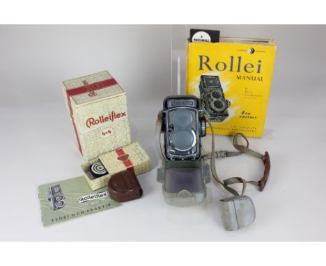 A Franke &amp; Heidecke grey Rolleiflex 4x4 camera, no.2020357, in original box, with accessories, together with Pearlman, Al