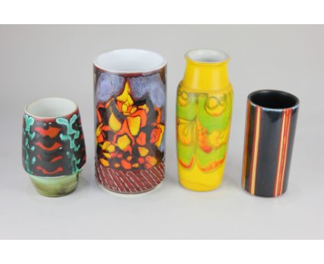 Four Poole pottery vases, to include a Delphis vase with abstract decoration on yellow ground, 24cm high