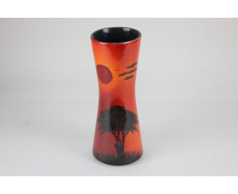 A Poole pottery Form vase by Andrew Tanner, decorated with a silhouette of a tree beneath a red sun, 24cm high