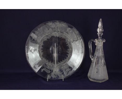 A Lobmeyr style glass dish, probably Austrian, engraved with stags amongst woodland, 34cm diameter, together with a similar g