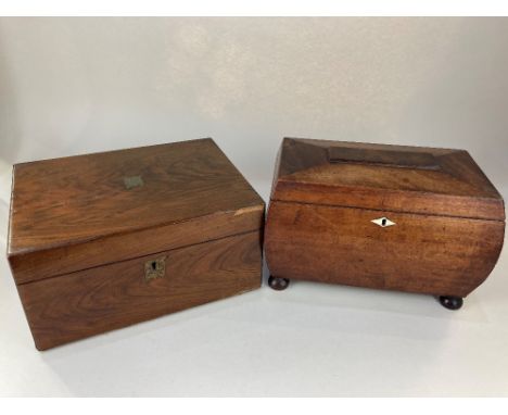 A 19th century mahogany bombe tea caddy, on bun feet, (missing interior) together with a Victorian rosewood writing slope, (a